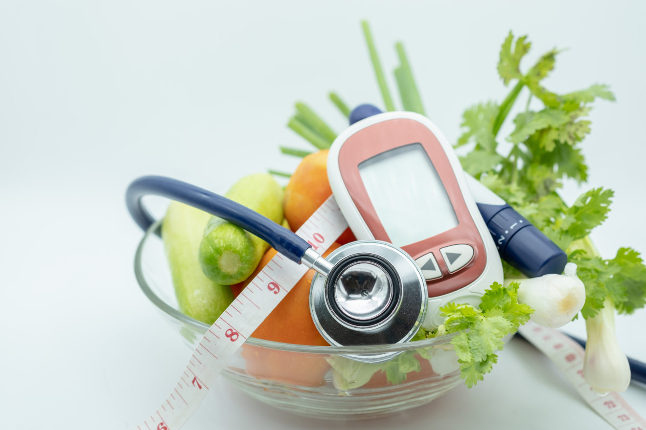 fruits, vegetables, diabetes glucometer, and other items