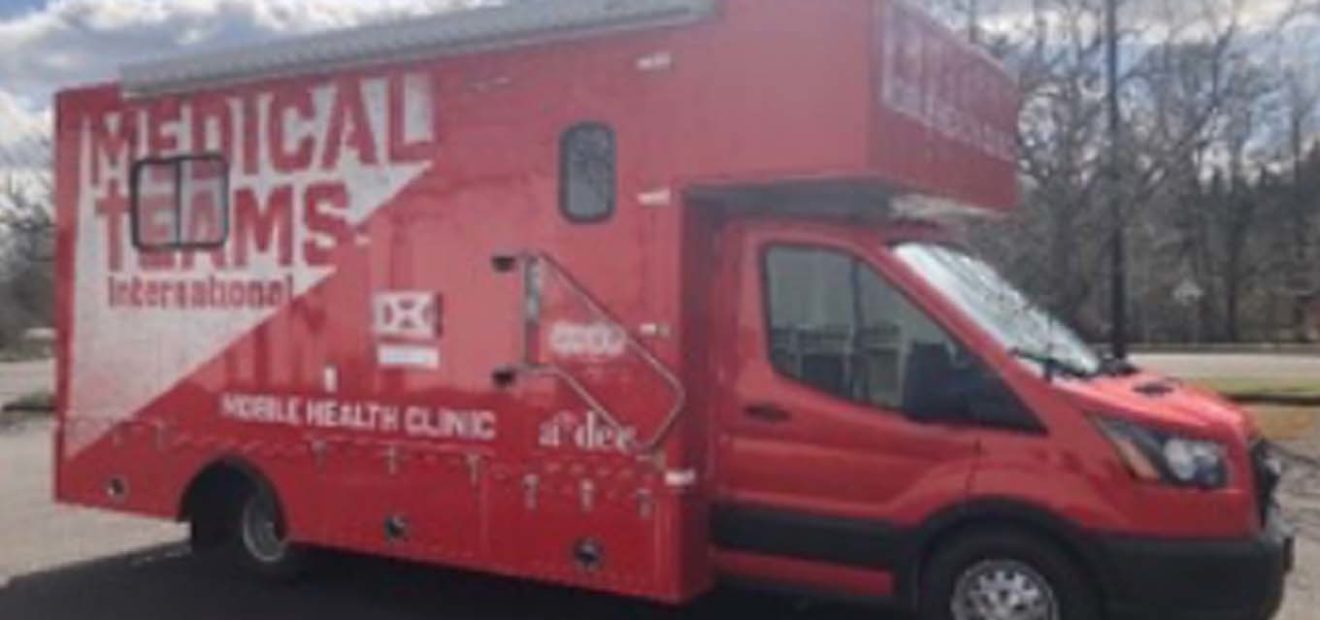 Bright red ambulance mobile medical clinic