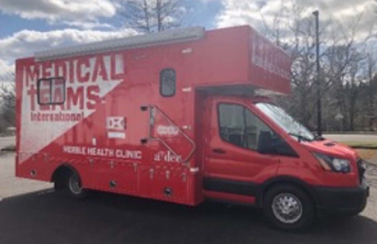 Bright red ambulance mobile medical clinic