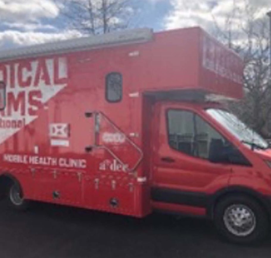 Bright red ambulance mobile medical clinic