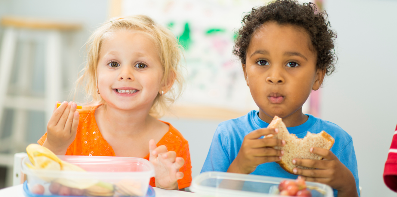 young children eating