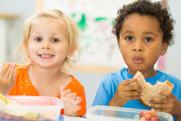 young children eating